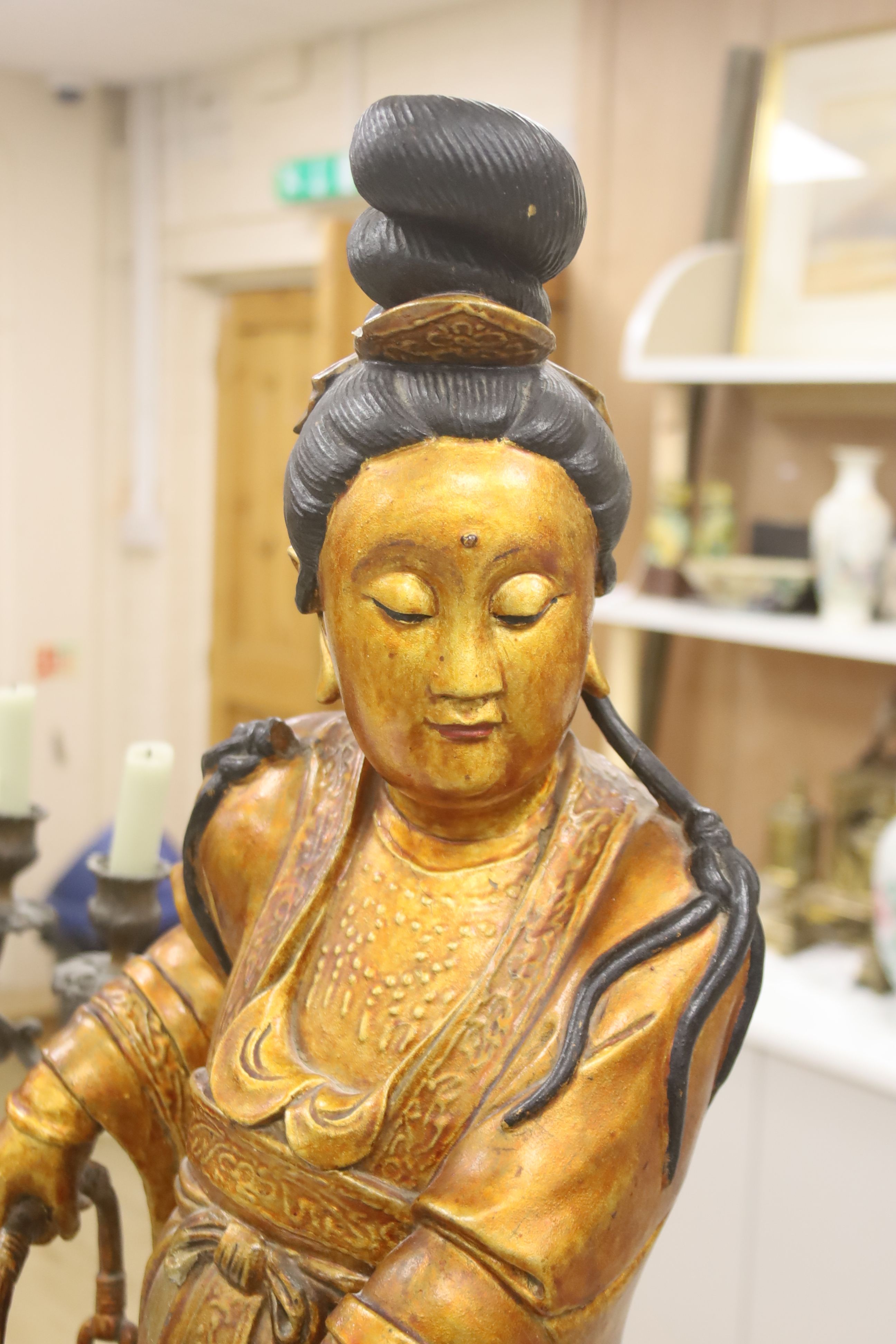 A large Chinese giltwood figure of a lady, height 59cm